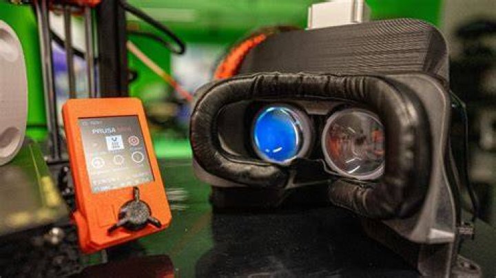 3d-printed vr headset on hook