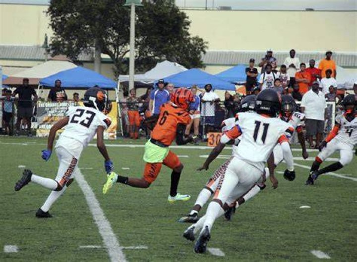 Bengals player Ki'Mari Brown rips off a big gain during a kickoff return against the Lauderhill Broncos.