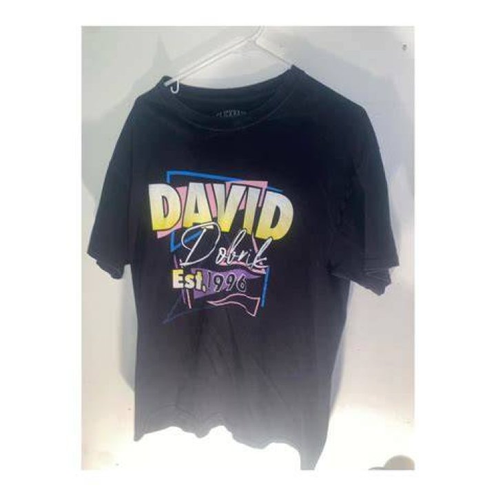 David Dobrik modelling his merchandise