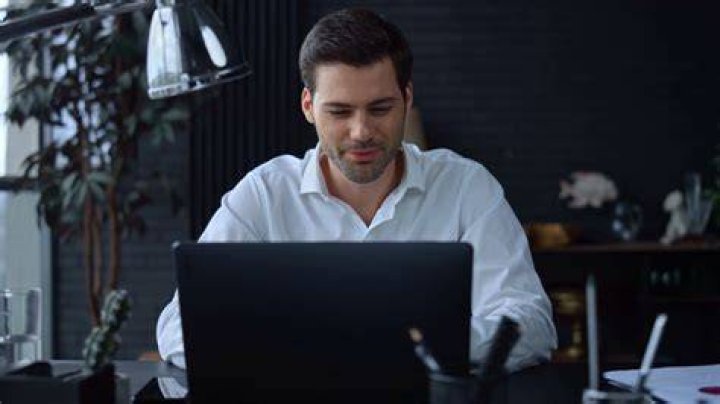 Man Looking at a Laptop's Screen