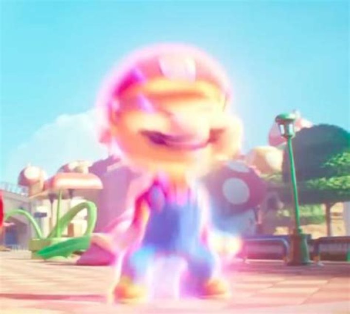 Mario transforms into his bigger form after eating a Super Mushroom in a still from The Super Mario Bros. Movie