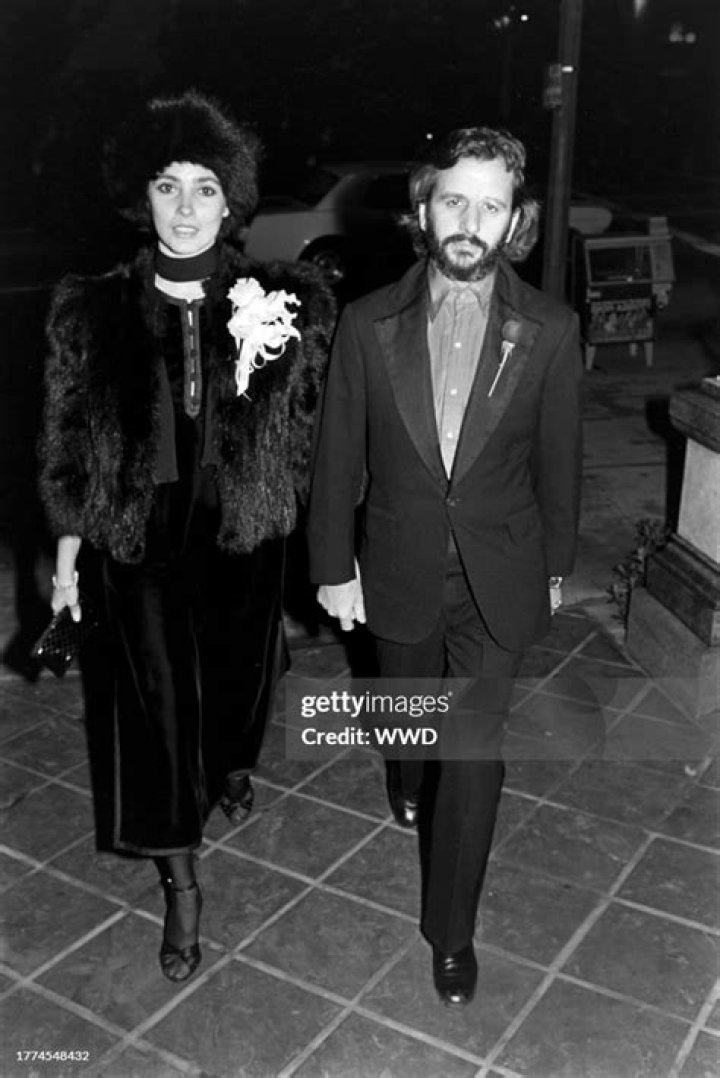 Nancy Lee Andrews and Ringo Starr posing together for a photo booth r