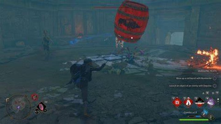 The player tosses an explosive barrel at several undead enemies.